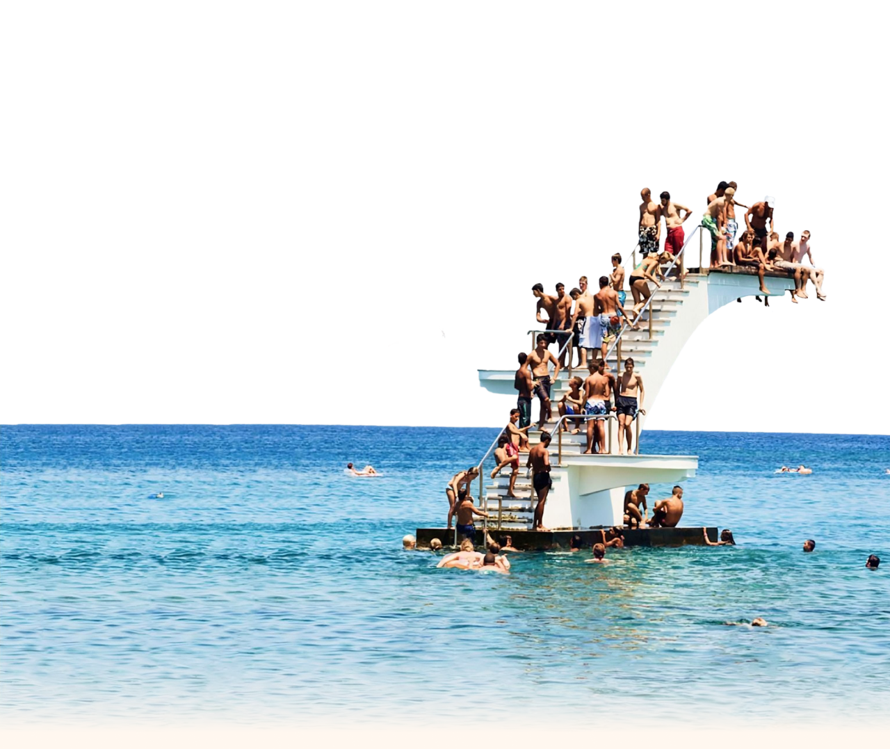 kids jumping off diving board into ocean