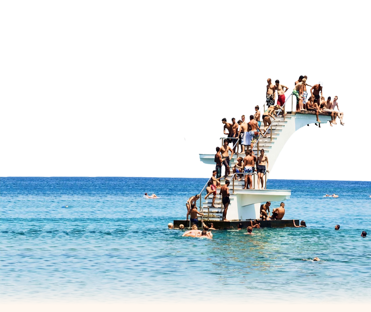 kids jumping off diving board into ocean